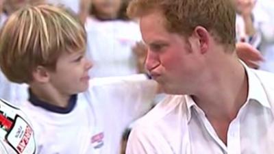 Prince Harry and child