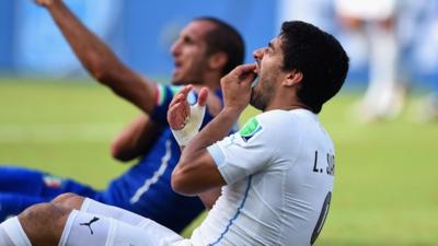 Uruguay's Luis Suarez and Italy's Giorgio Chiellini