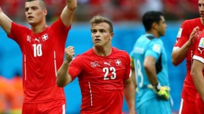 Switzerland go marching on thanks largely to hat trick hero Xherdan Shaqiri