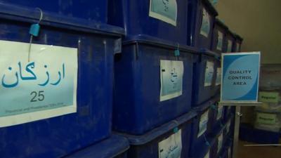 boxes of votes inside count centre