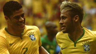 Brazil's Neymar celebrates with Hulk after scoring in the 2014 World Cup