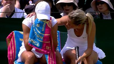 Wimbledon 2014: Doubles serve smashes partner in head