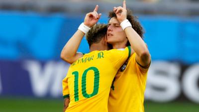 Brazil's Neymar and David Luiz celebrate victory over Chile