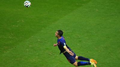 Robin Van Persie scores a header for the Netherlands against Spain