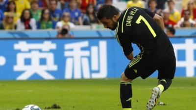 David Villa scores a back-heel against Australia