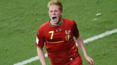 Kevin de Bruyne slots the ball past Tim Howard