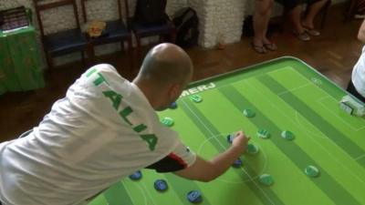 Button football participant