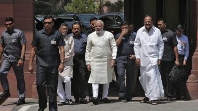 Prime Minister Narendra Modi (centre)