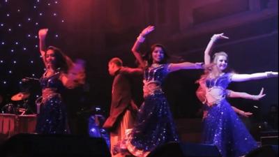 Bollywood dancers on stage performing