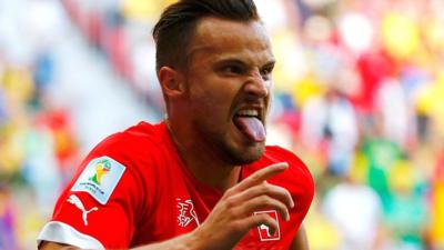 Haris Seferovic celebrates his winning goal for Switzerland against Ecuador