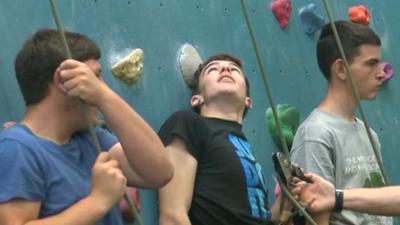 Youngsters climbing at Boulders