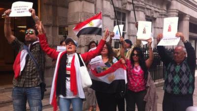 A group of people gathered to protest about the sale in London