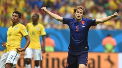 Daley Blind celebrates after scoring for the Netherlands against Brazil