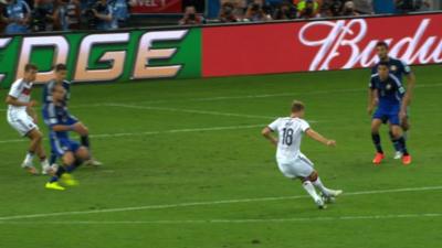 Toni Kroos passes a shot wide of the post for Germany after being put in by Mesut Ozil during the 2014 World Cup final against Argentina