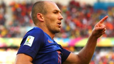 Arjen Robben celebrates scoring against Australia