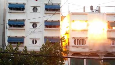 A still from footage shows the moment a Gaza house was destroyed by Israeli airstrike