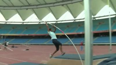 athlete in Delhi's olympic stadium