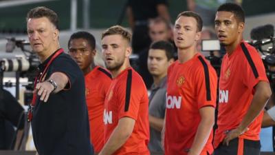 Manchester United manager Louis Van Gaal with players Antonio Valencia, Luke Shaw, Jonny Evans and Chris Smalling during the club's pre-season tour in America