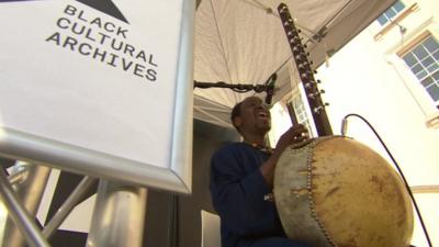 A man performing at the Black Cultural Archives