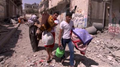 Gaza residents gather belongings