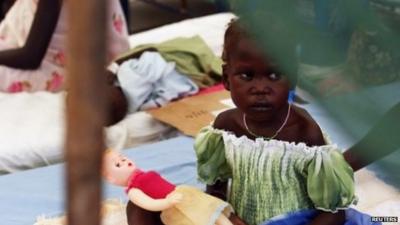 Child with doll in south sudan