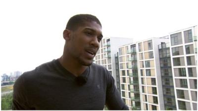 Anthony Joshua returns to the Olympic Village where he stayed during the 2012 Games