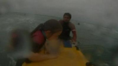 RNLI rescue girl in rip current