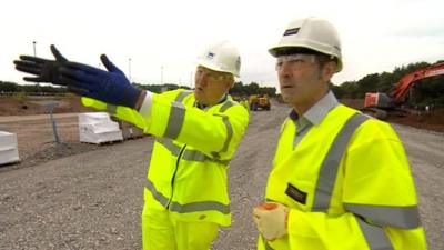 Workman at the site of the A453 roadworks