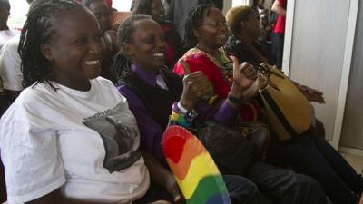 activists smiling in court