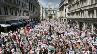 Protestors march down Regent Street