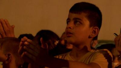 A boy praying