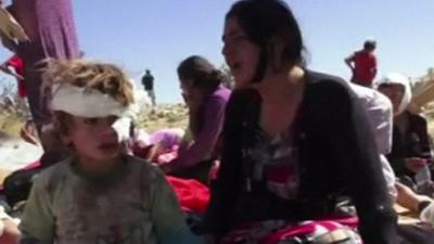 Iraqi Kurds in makeshift campsi n the mountains