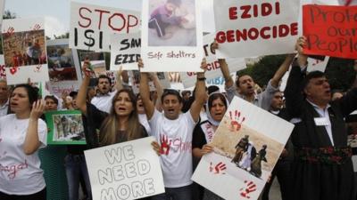 Kurdish activists rally outside the White House in Washington,