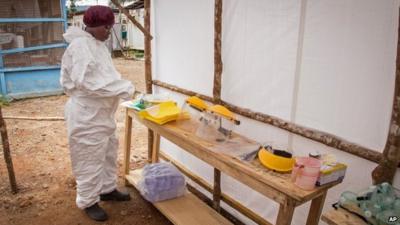 A woman wearing protective clothing