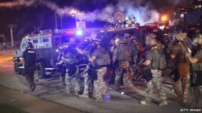 Officers in riot gear shot rubber bullets and tear gas