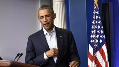 Barack Obama, pictured in the White House press briefing room on 18 August