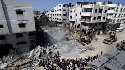 Aftermath of air strike on Gaza City"s Sheikh Radwan neighbourhood which killed the wife and infant daughter of Hamas military chief Mohammed Deif