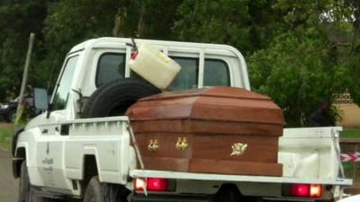 Car with coffin