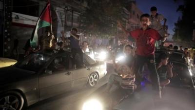 Palestinians celebrate ceasefire in Gaza City