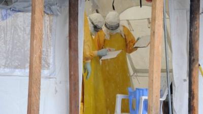 Health care workers in protective clothing in Liberia