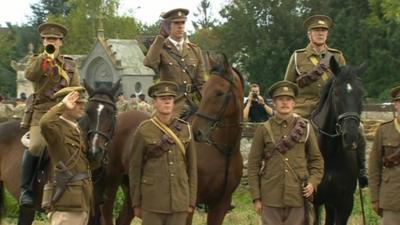 People marching in WW1 army uniform