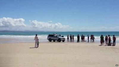 People on Byron Beach after death of man in shark attack