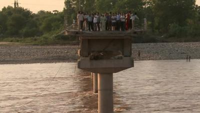 Bridge in Jammu washed half washed away by floodwaters