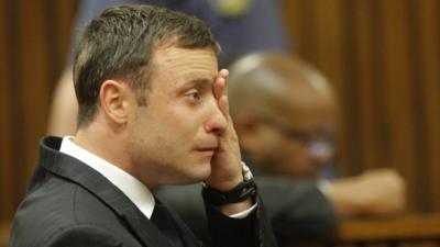 Pistorius wipes his eyes in court