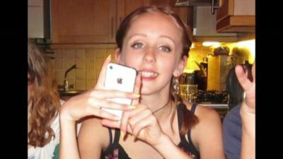 Alice Gross with her white iPhone 4 s