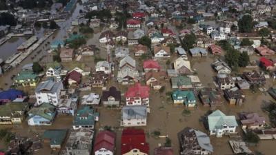 An aerial view showing buildings partially submerged in Srinagar, Indian-controlled Kashmir, Thursday, Sept. 11, 2014