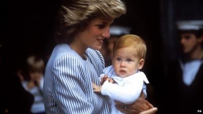 Diana, Princess of Wales, carrying Prince Harry on 7 August 1985