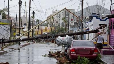 Damage caused by Hurricane Odile to a street in Cabo San Lucas