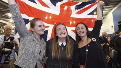 Supporters from the "No" Campaign celebrate as they hold up a Union flag, in Edinburgh, Scotland September 19, 2014