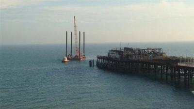 Hastings Pier and barge